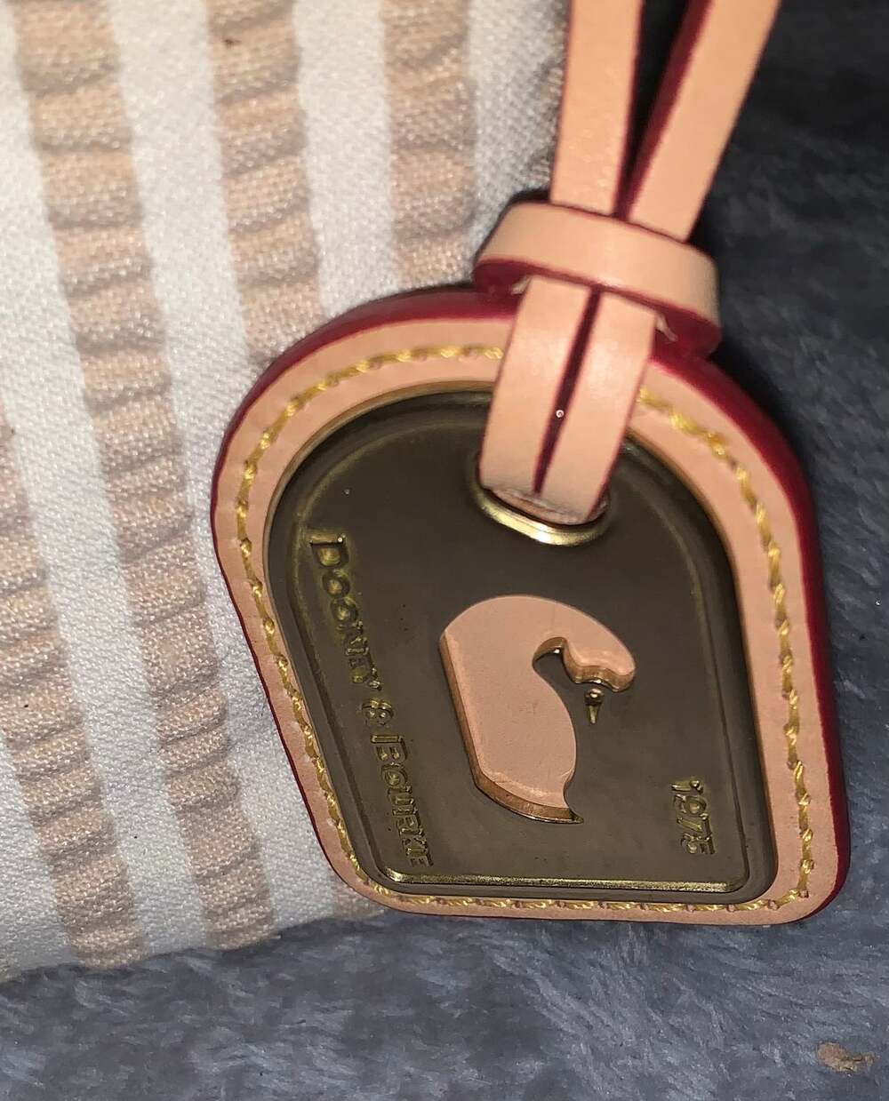 Dooney & Bourke Cream and Tan Striped Shoulder Bag with Navy Trim - Picture 3 of 6